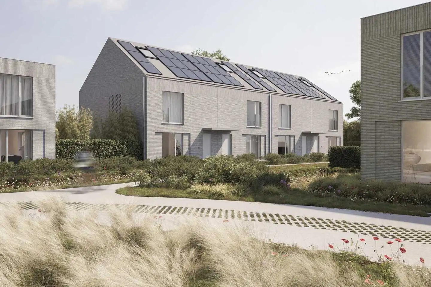 Rijtjeswoningen met PVT-panelen op het dak in Mariakerke